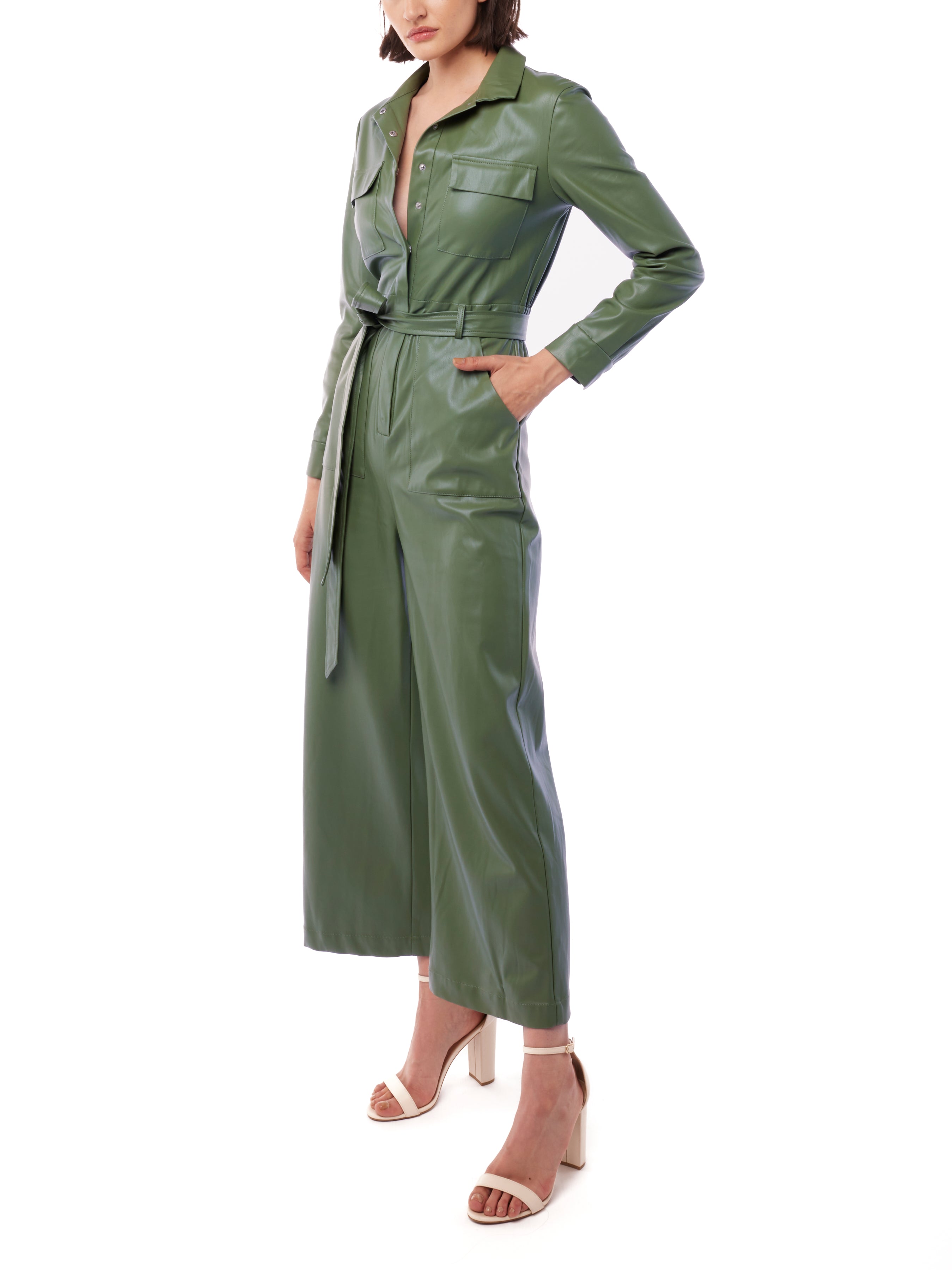 faux leather jumpsuit with long sleeves, wide legs, snap front, pockets and waist tie and elastic waist in olive