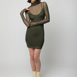 figure hugging, long sleeve mini dress with a sheer mock neck, sheer long sleeves with a spaghetti strap slip lining in olive
