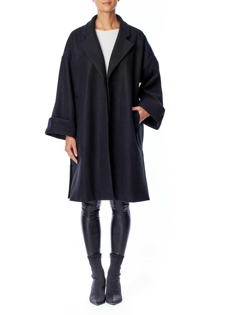 Cari faux wool oversized jacket with open front, large cuffs and side slits in black