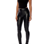 vegan leather legging with a medium rise and flattering fit in black