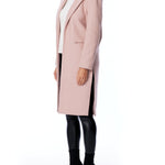vegan jacket featuring a flattering slim fit, open front, pointed collar and side slits in blush