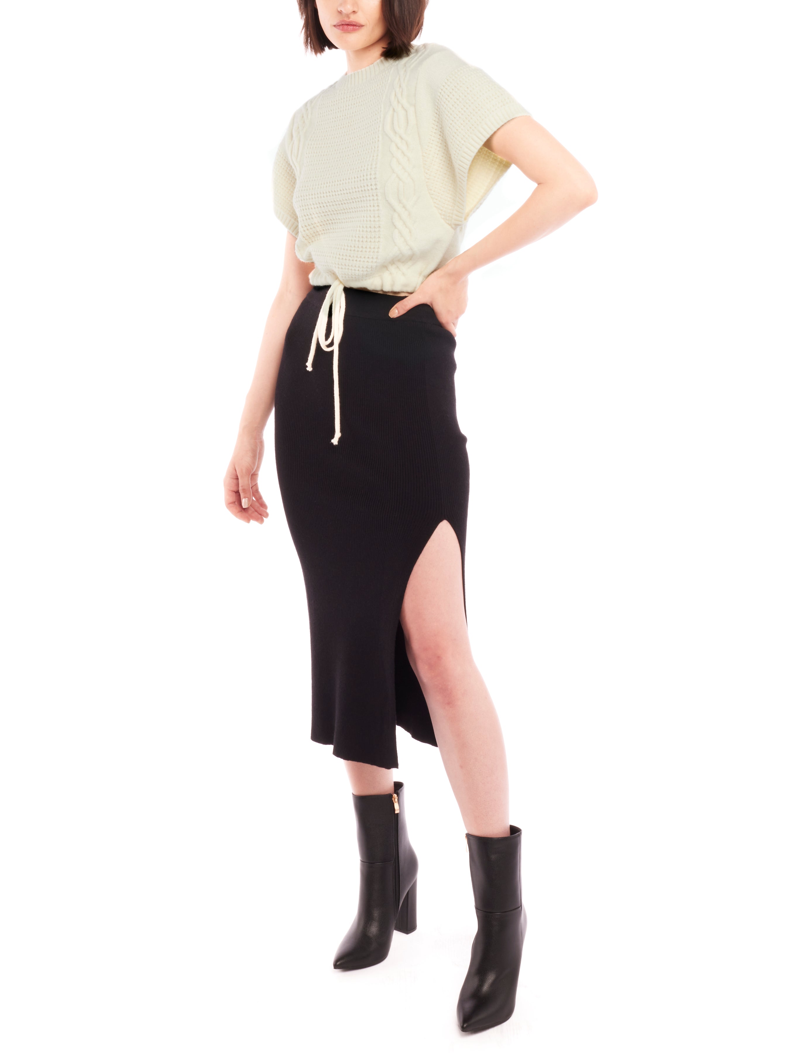 Cropped cable knit, short sleeve sweater with a drawstring, adjustable cinched waist - front view
