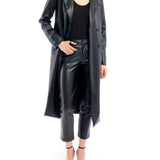 Midi length, double breasted, vegan leather jacket featuring long sleeves and pockets