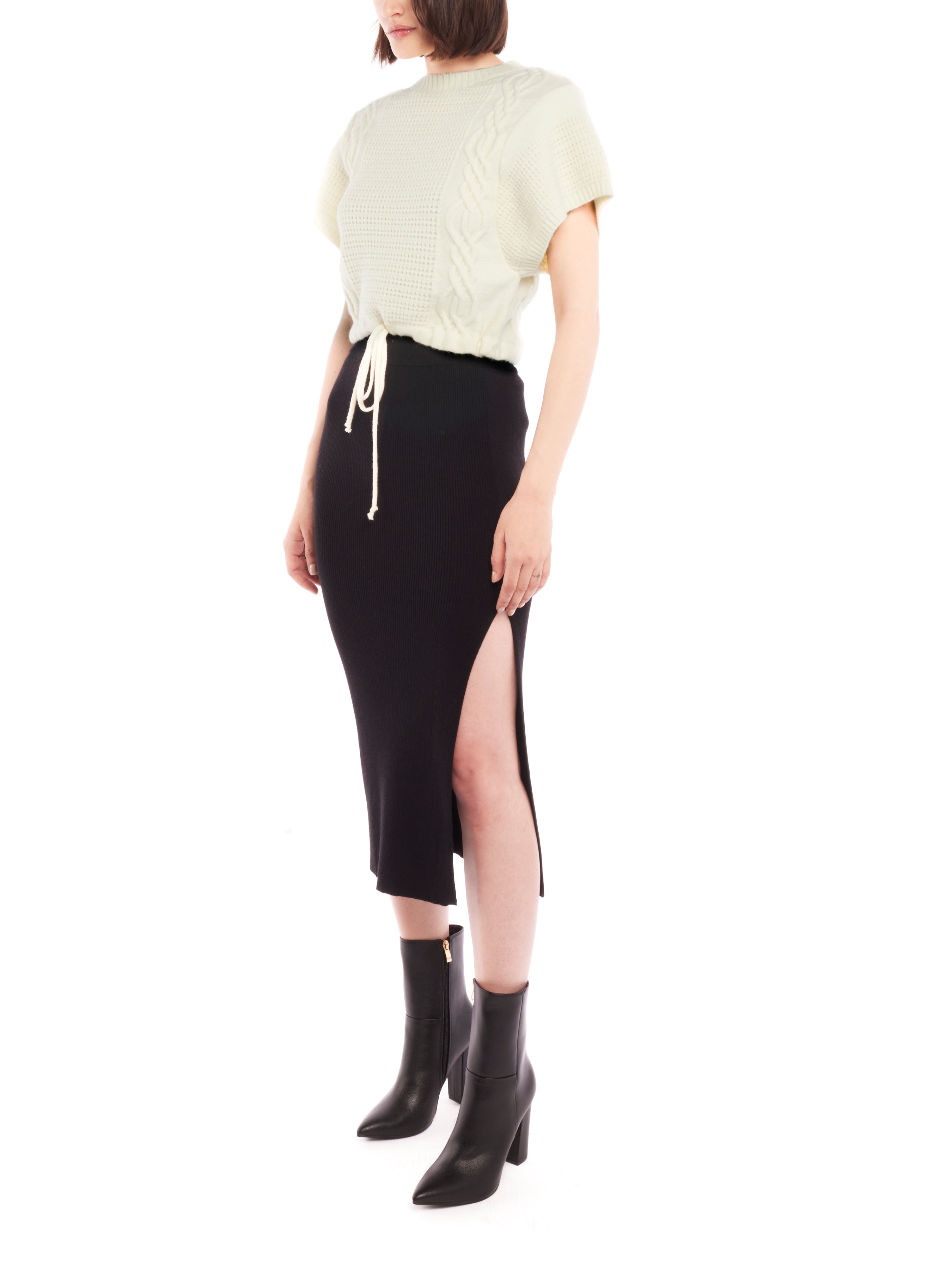 Cropped cable knit, short sleeve sweater with a drawstring, adjustable cinched waist - side view