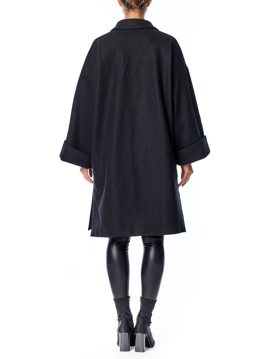 Cari faux wool oversized jacket with open front, large cuffs and side slits in black