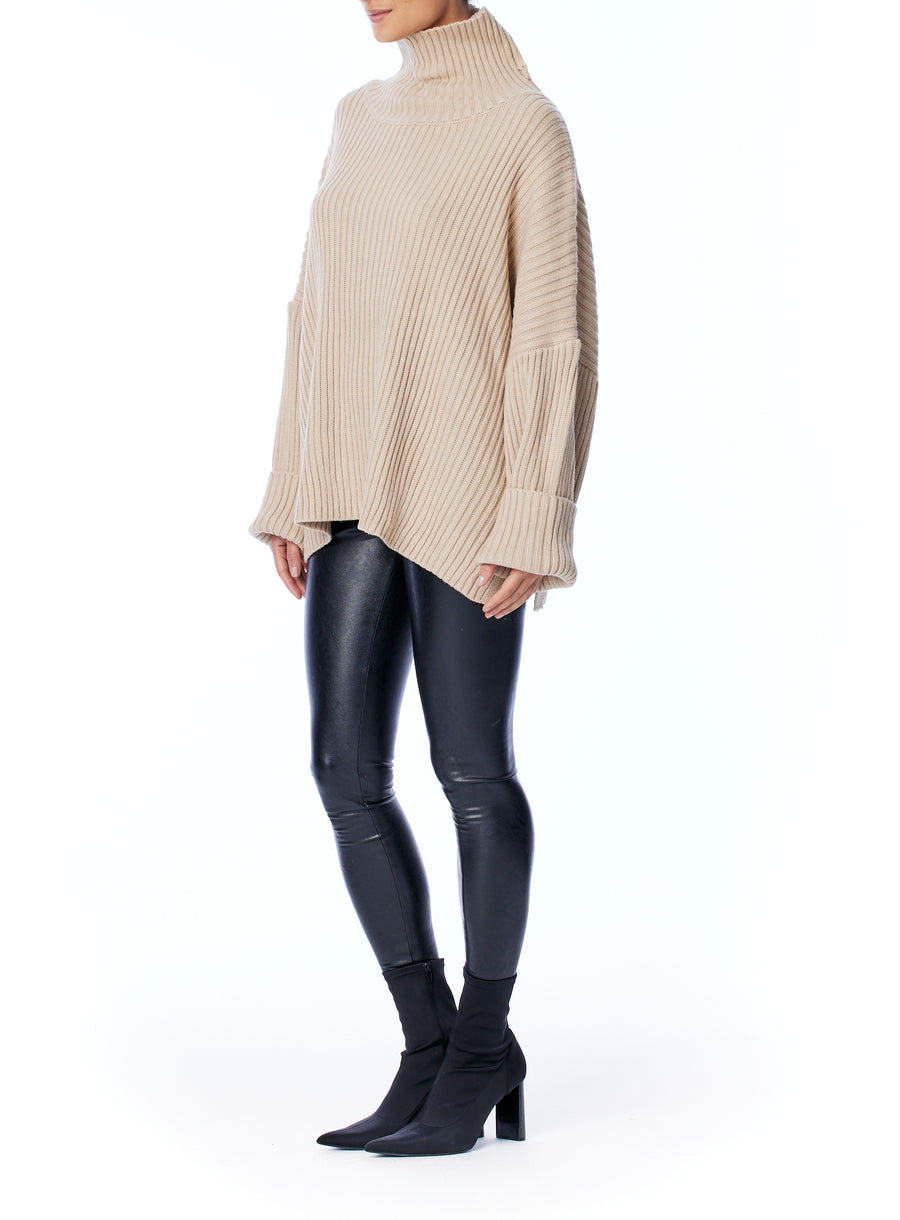 Cozy, oversized sweater with ribbed detailing and comfy turtleneck in oatmeal