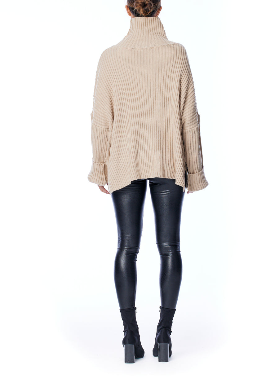 Cozy, oversized sweater with ribbed detailing and comfy turtleneck in oatmeal