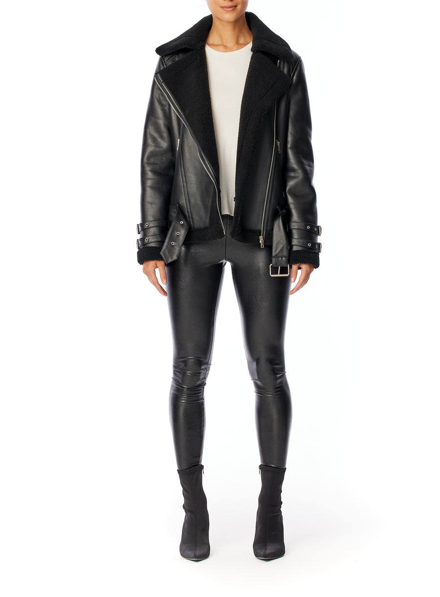 vegan leather oversized moto jacket with zippers, grommets, bottom belt and faux shearling lining