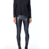 turtleneck sweater with long sleeves, relaxed fit, cross seam detailing and drop shoulder in black