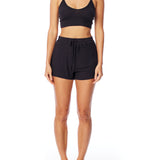 Medium rise, comfy ribbed lounge shorts with elasticized drawstring waist and relaxed fit in black