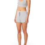 Medium rise, comfy ribbed lounge shorts with elasticized drawstring waist and relaxed fit in grey