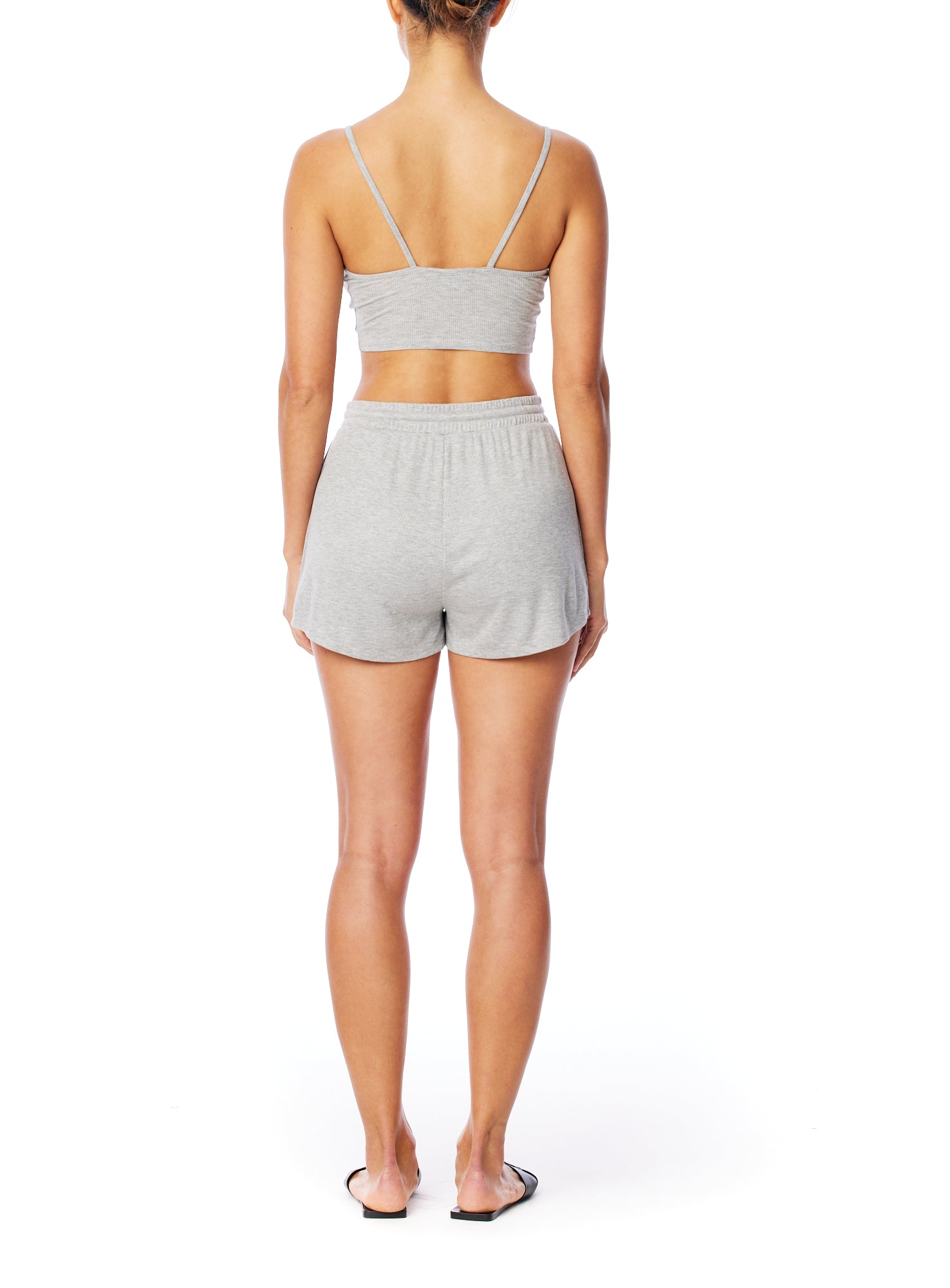 Medium rise, comfy ribbed lounge shorts with elasticized drawstring waist and relaxed fit in grey