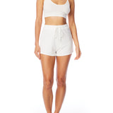 Medium rise, comfy ribbed lounge shorts with elasticized drawstring waist and relaxed fit in ivory