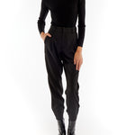 ribbed long sleeve bodysuit with a crew neck and flattering open back with a single strap mid back 