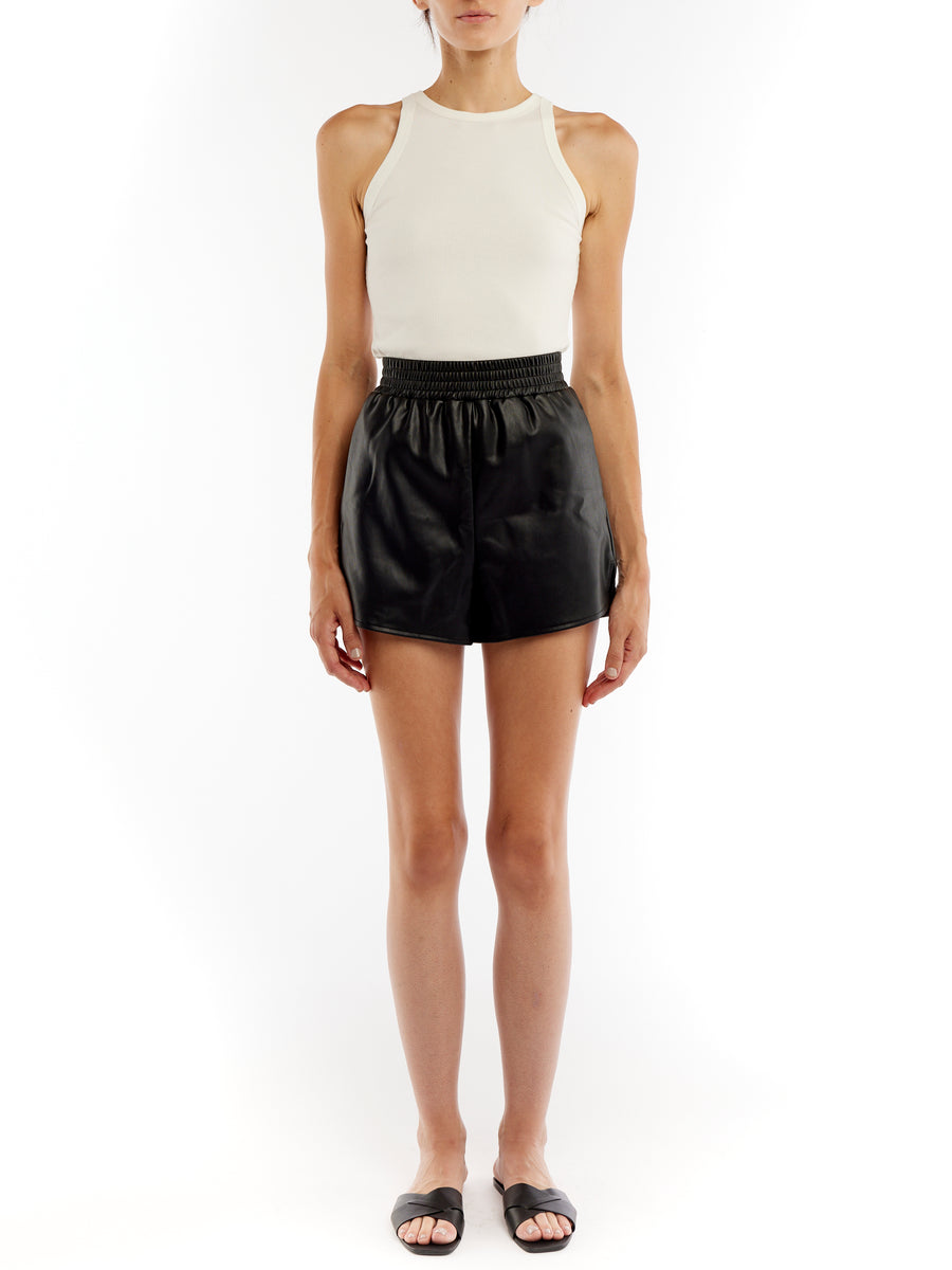 vegan leather shorts with a shirred, elasticized high-waist, side pockets and side vent slits