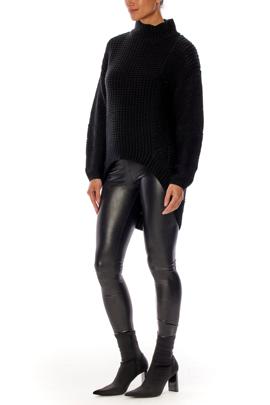 mock neck sweater with long sleeves, high-low hem and multi-knit design detailing in black