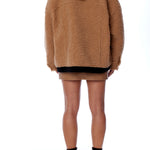 Cozy zip up, hooded jacket with faux shearling, side pockets and snap detailing in coco and black