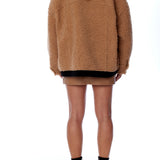 Cozy zip up, hooded jacket with faux shearling, side pockets and snap detailing in coco and black