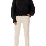 ribbed, chunky knit turtleneck sweater featuring slight balloon sleeves and a funnel neck in black