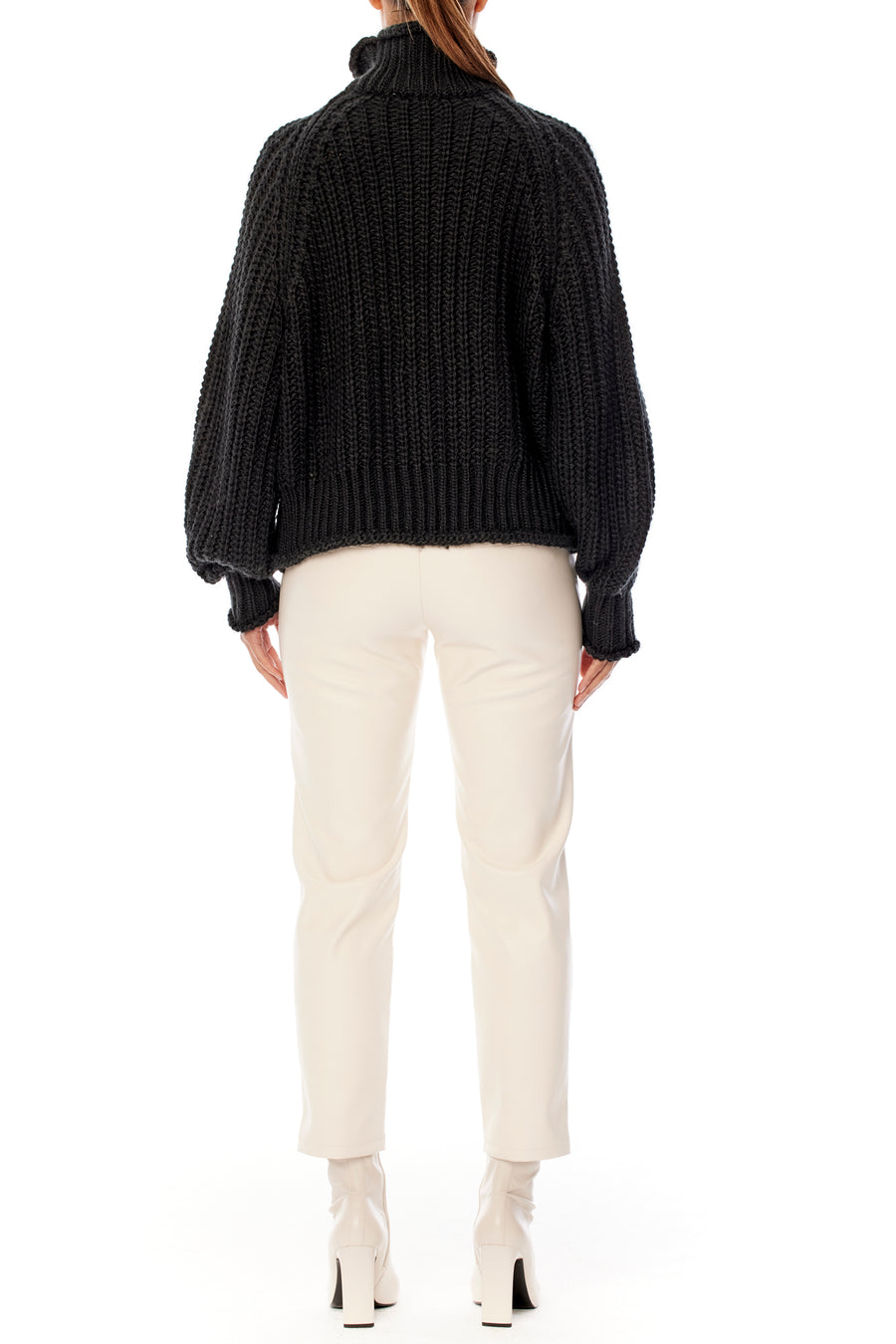 ribbed, chunky knit turtleneck sweater featuring slight balloon sleeves and a funnel neck in black