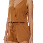 romper with an elasticized drawstring waist romper and criss cross front in meerkat