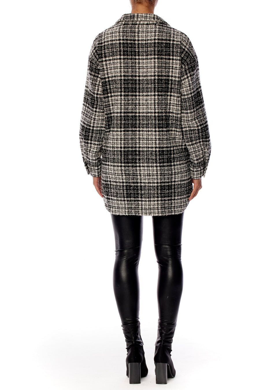 Cozy black and white plaid button up top with shirttail hem, collar and front and side pockets