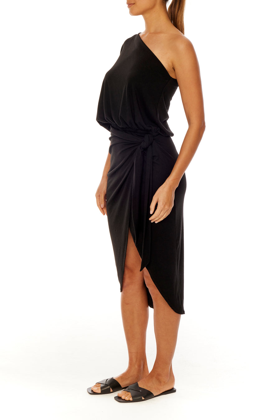 elegant one shoulder dress with draped top, wrap bottom, side tie and tulip hem in black
