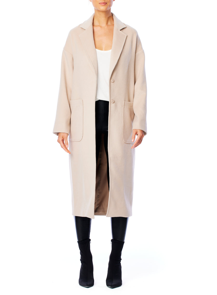 chic midi length jacket featuring hidden snap closure and large front pockets
