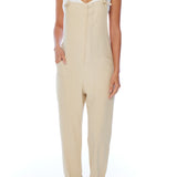 relaxed overalls with knotted front shoulder straps, racer back shoulder straps and pockets in creme